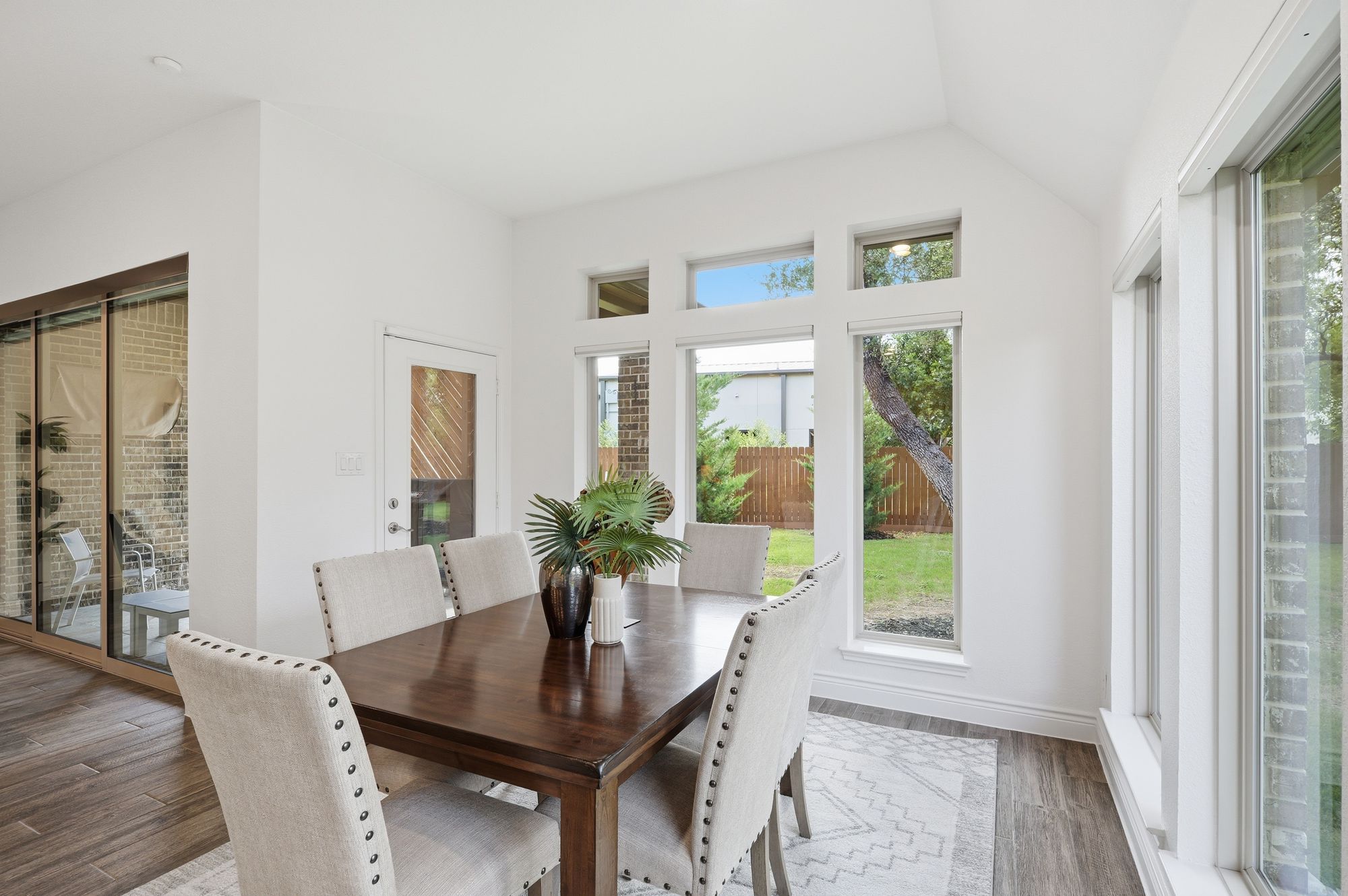 Dining area with views of the backyard