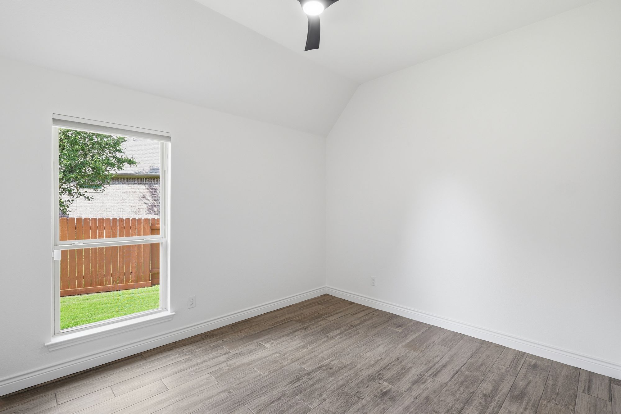 Bedroom overlooking the yard