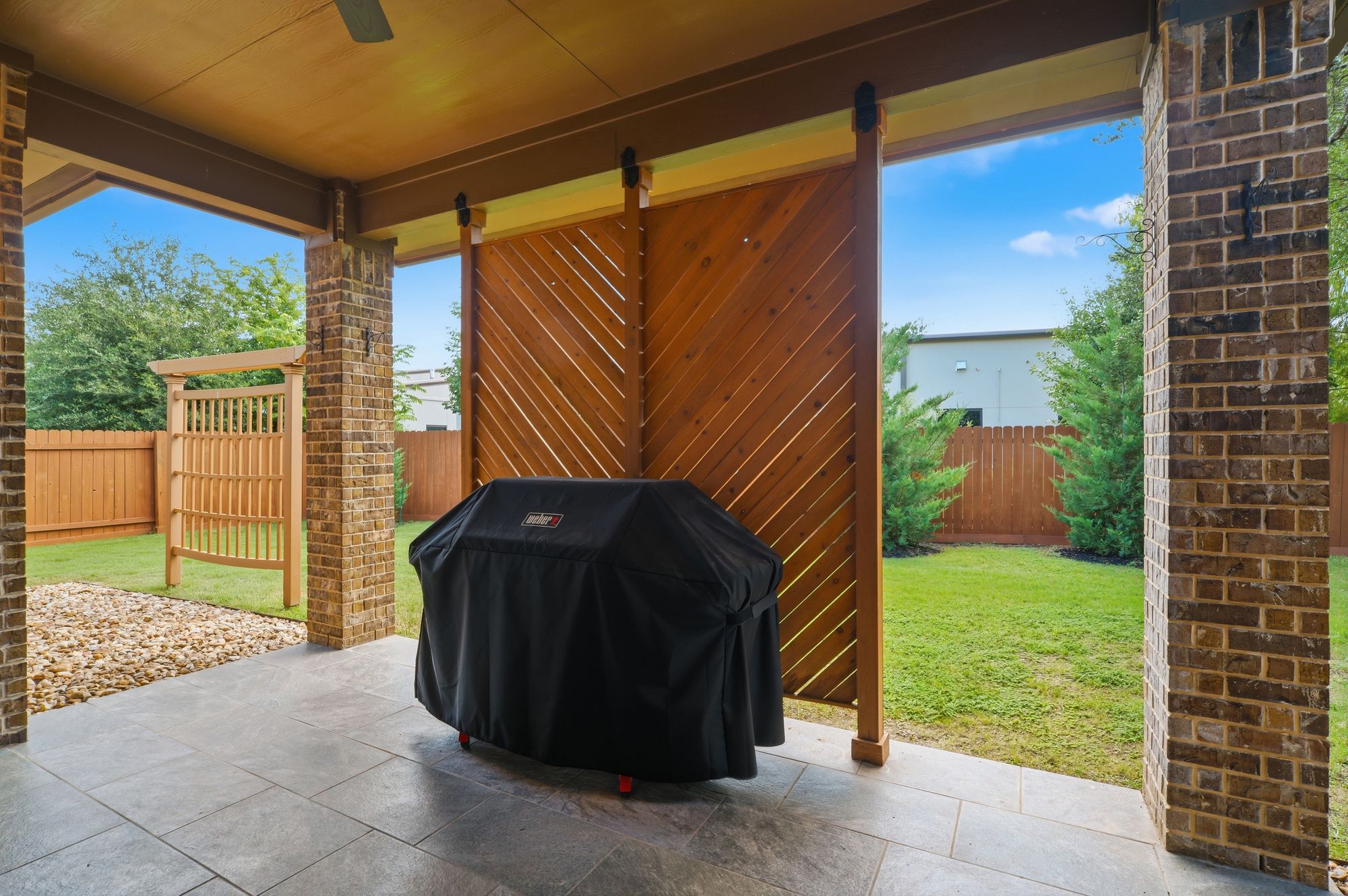 Covered patio with cedar privacy screen