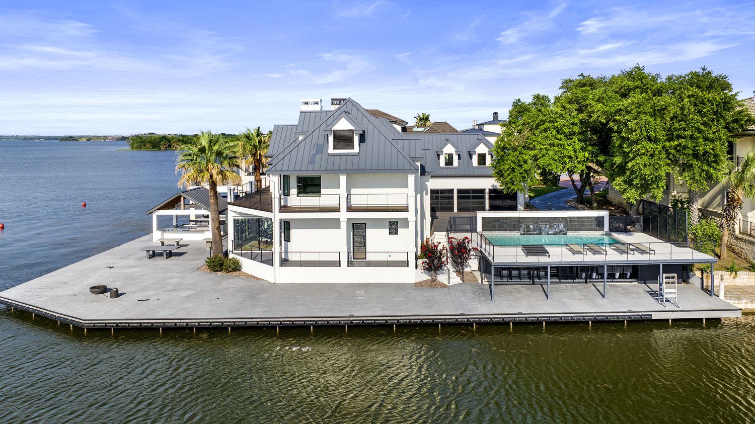 Aerial showing the pool and waterfront