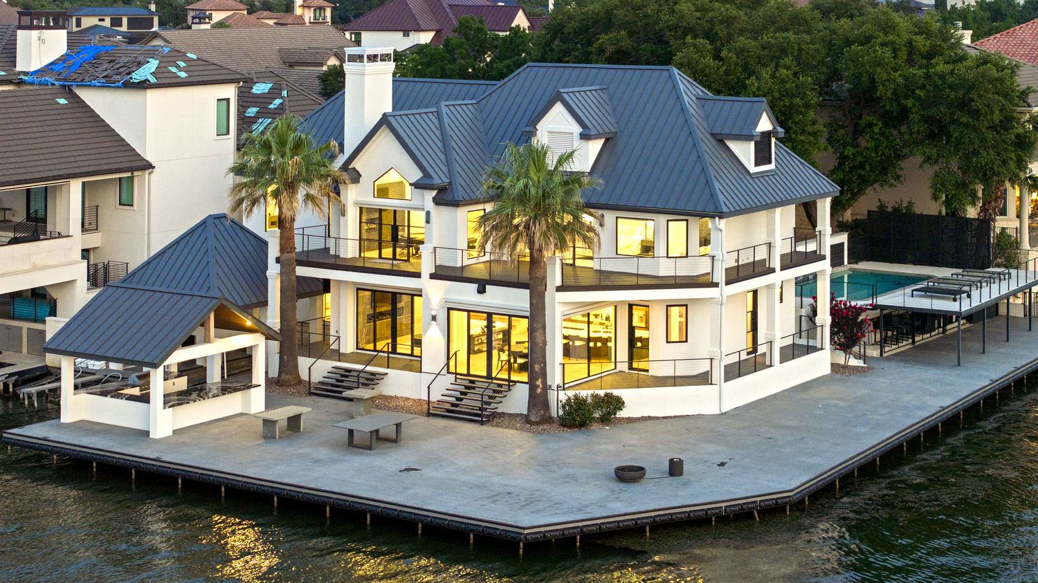 Waterfront estate at twilight